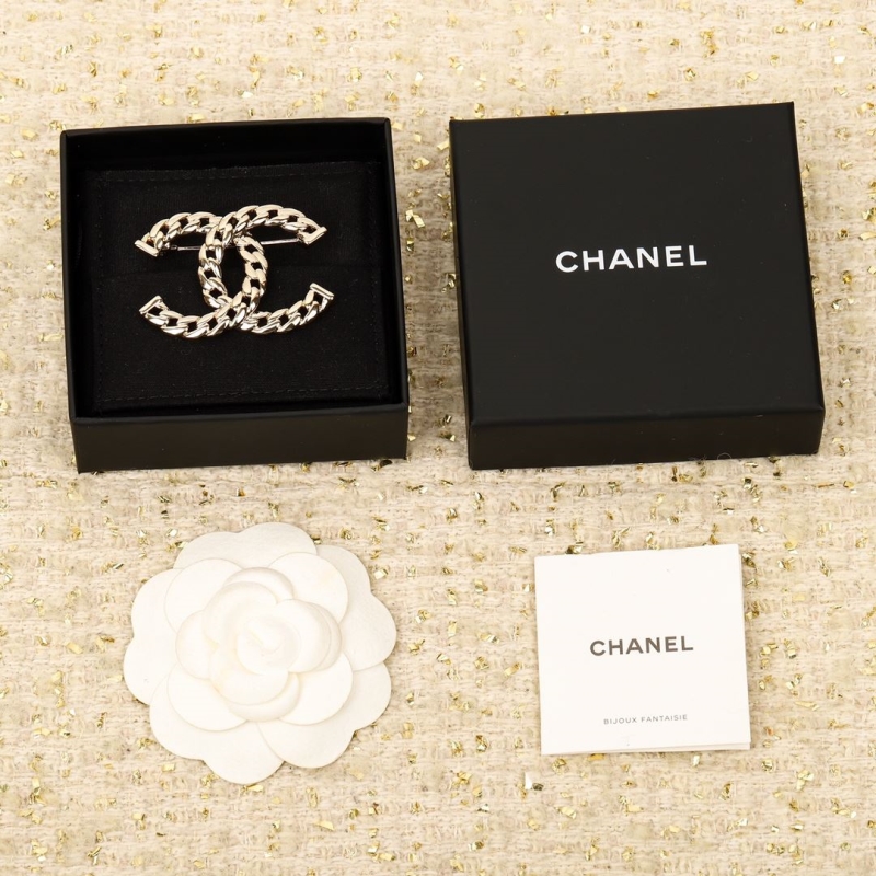 Ch*el brooches